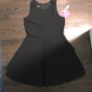 Girls dress.  Amy Byer brand. New with tags.  Can be dressed up or down.